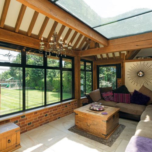 54160,Cushioned benches in sunny conservatory