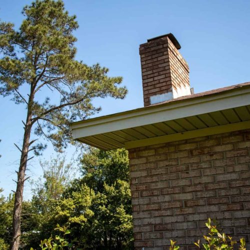 Chimney on the roof of a suburban home
