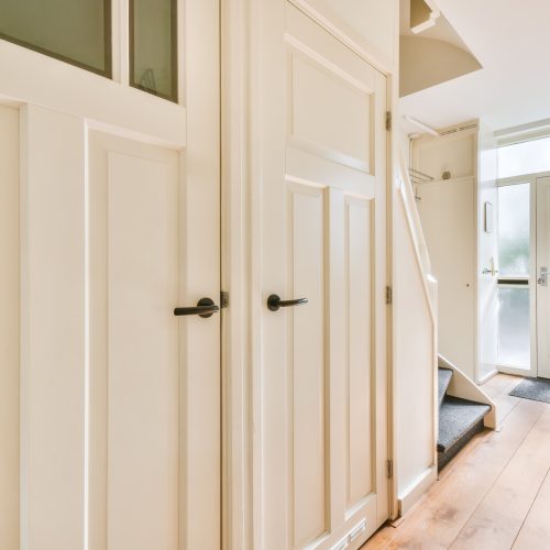 The front door of the house and a small corridor